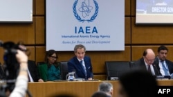 IAEA chief Rafael Grossi (center) attends the board of governors meeting at the agency's headquarters in Vienna on June 3. 
