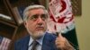 Afghan presidential candidates Abdullah Abdullah gestures as he speaks during an interview with AFP at the Sapedar Palace in Kabul on November 5.