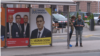 Sarajevo, Bosnia and Herzegovina young people in front of election billboards 