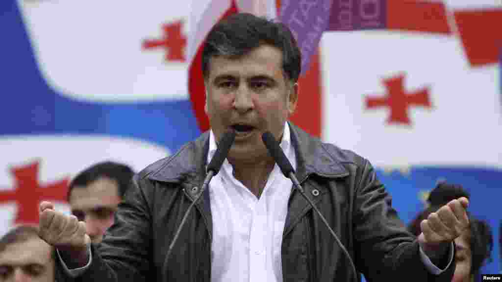 President Mikheil Saakashvili addresses people during a rally held by United National Movement party supporters in Tbilisi on April 19, 2013.