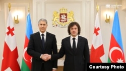 ვილაიათ ეივაზოვი (მარცხნივ) და ირაკლი კობახიძე