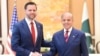 Pakistani Prime Minister Shehbaz Sharif (right) shakes hands with US Vice President JD Vance ahead of US-Iran peace talks in Islamabad on April 11.
