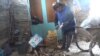 Kyrgyzstan - Woman collects animal bones to make money