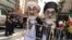 People dressed as Iran's Supreme Leader, Ayatollah Ali Khamenei and Iranian President Hassan Rohani protest on the street against Iran in New York, New York, September 24, 2018
