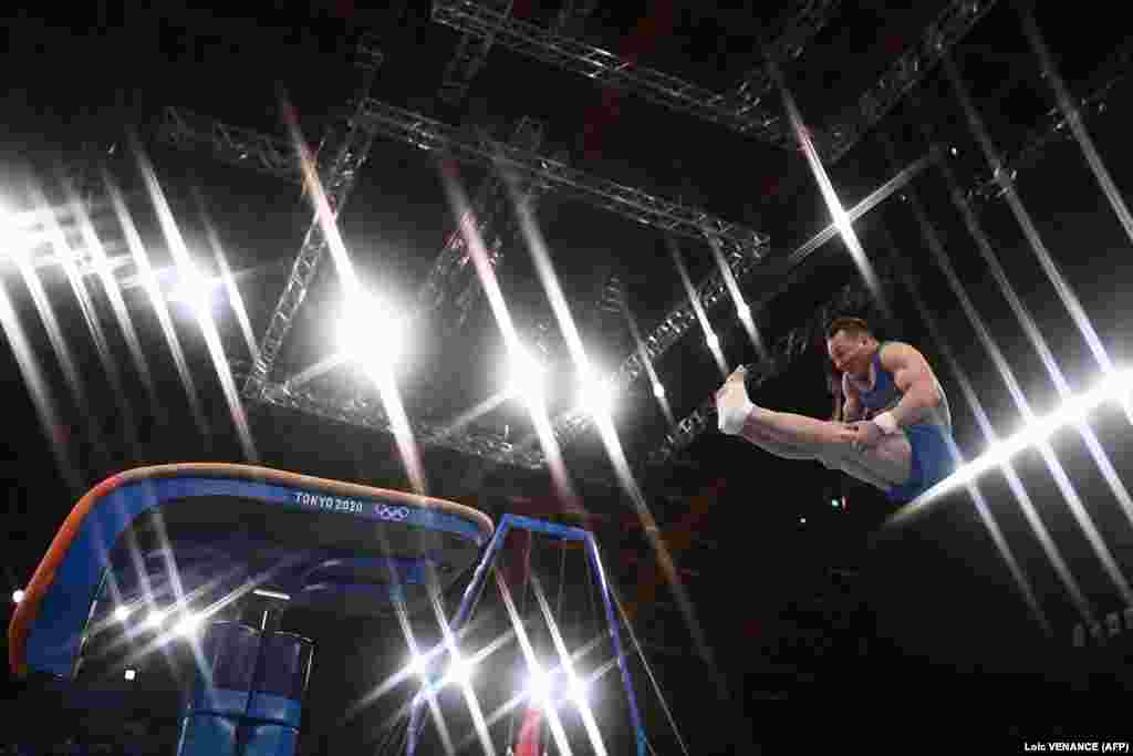 Ukraine&#39;s Ihor Radivilov competes in the vault event of the artistic gymnastics men&#39;s qualification during the Tokyo 2020 Olympic Games in Tokyo on July 24.