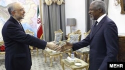 Special Syria envoy Kofi Annan (right) shakes hands with Iranian Minister for Foreign Affairs Ali Akbar Salehi in Tehran on April 11.