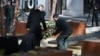 Belgium's King Philippe lays a wreath during the inauguration of a memorial as the country marks the first anniversary of the twin Brussels attacks on March 22.