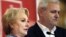Romanian Prime Minister Viorica Dancila (left) and Social Democratic Party Liviu Dragnea speak to the press in Bucharest.