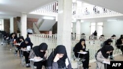 Students sit for their university entrance exam in Tehran in June.