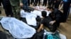 Тела погибших при взрывах в Кермане, Иран, 3 января 2023