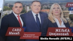 Election billboards featuring Milorad Dodik (center), who is banned from running
