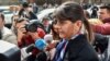 Laura Codruta Koevesi is surrounded by reporters as she arrives for a hearing at the Special Investigative Section for Prosecutors headquarters in Bucharest on March 7.