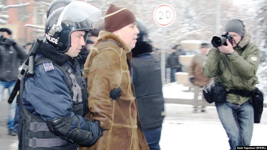 Kazakh police arrest people protesting in the country's main city, Almaty, over the events in Zhanaozen on December 17.