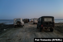 Fishermen's vehicles on the shore