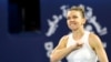 Simona Halep sărbătorește câștigarea finalei turneului de tenis din Dubai, 22 februarie 2020.