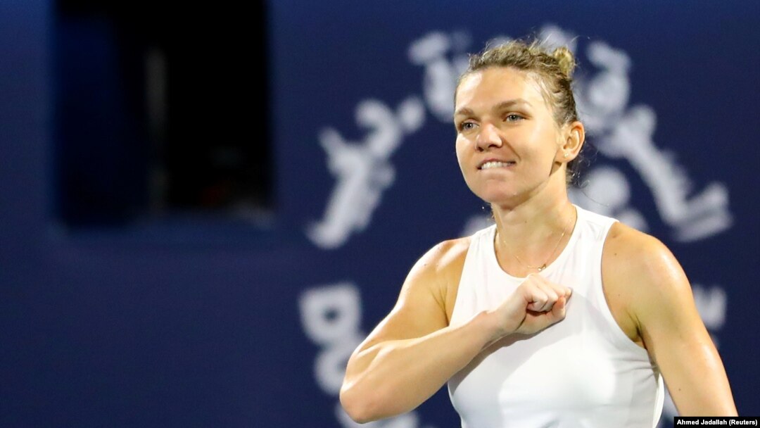 Simona Halep sărbătorește câștigarea finalei turneului de tenis din Dubai, 22 februarie 2020.