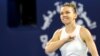 Simona Halep celebrates after winning the final in Dubai in February 2020.