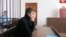 Andrei Popov appears in the courtroom in Saratov on March 13.