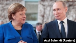 Ангела Меркель и Владимир Путин.
