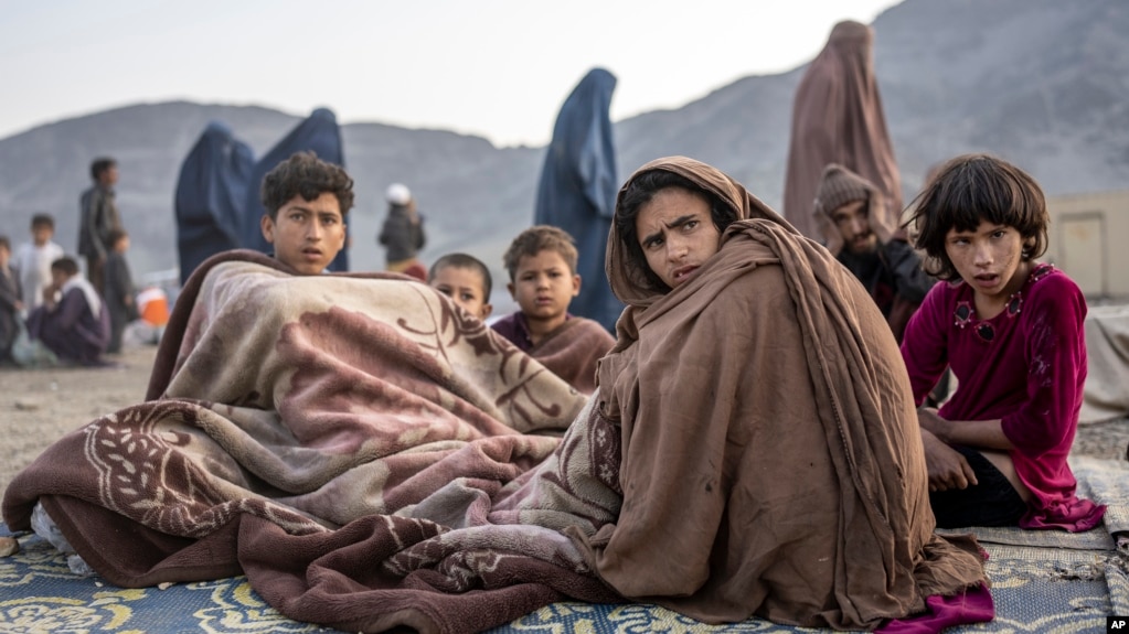 Afghan refugees rest at a camp near the Torkham Pakistan-Afghanistan border crossing in Afghanistan on November 3, 2023. More than half a million Afghans were forced to leave Pakistan when Islamabad announced its plans to expel "undocumented foreigners."