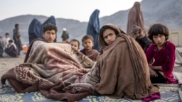 Afghan refugees settle in a camp in Afghanistan near the Pakistani border after being ordered home by Islamabad.