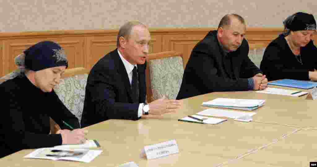 President Putin meeting with representatives of the Mothers of Beslan Committee in Moscow on September 2, 2005 (epa) - Officials say hostage takers started the massacre by setting off a bomb inside the school. Aleksandr Torshin, the head of an official parliamentary commission investigating the events, has thrown his weight behind this version.