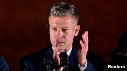 "My fellow Hungarians -- we have done it," opposition leader Peter Magyar told supporters in Budapest. 