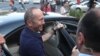 Armenia -- Former President Robert Kocharian talks to reporters outside a prison in Yerevan, June 25, 2019.