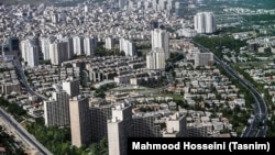 Modern Tehran aerial view shows the extent of large building projects.