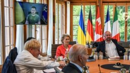 Ukrainian President Volodymyr Zelenskiy addresses Group of Seven leaders and EU representatives via video link at the G7 summit in Germany on June 27.