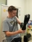 Ukraine - Ukrainian start-up company Allbionics makes prosthetic limbs for vets wounded in war - screen grab - Current Time
