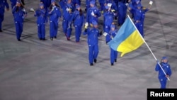 Олена Підгрушна була прапороносицею на відкритті попередньої Олімпіади в Пхенчхані у 2018 році