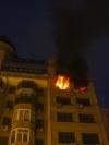 A fire burns in an apartment building hit by a Russian strike in the early hours of July 10. 