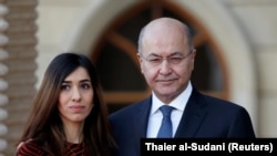 Iraqi President Barham Salih meets with Nobel Peace Prize laureate and Yazidi activist Nadia Murad at the Salam Palace in Baghdad on December 12, 2018.