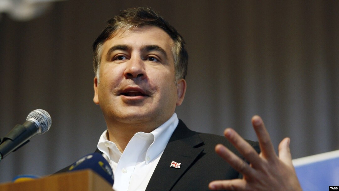 Former Georgian President Mikheil Saakashvili Saakashvili is not in Georgia at the moment, having taken a lecturing post at a U.S. university since leaving office in November 2013.
