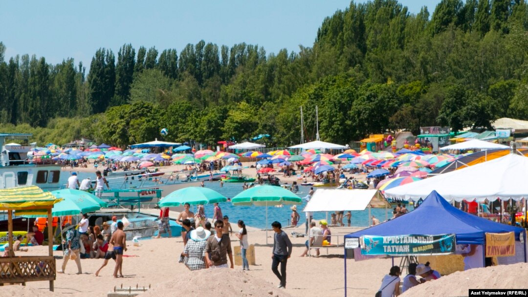 It seems like locals around Lake Issyk-Kul will vote for the ruling parties. There are new buildings everywhere, restaurants, stores, boutiques, and a line of recently built hotels right down by the water that block the view of the beach.