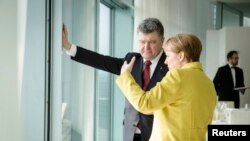 Ангела Меркель и Петр Порошенко, архивное фото