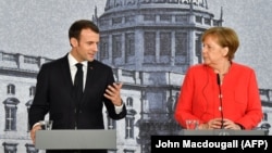 Президент Франції Емманюель Макрон та канцлер Німеччини Анґела Меркель пропонують формувати бюджет єврозони з 2021 року