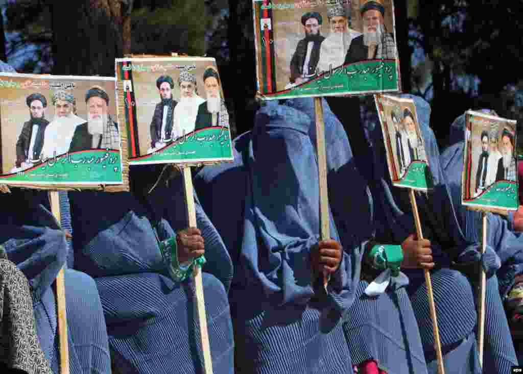 Supporters of Afghan presidential candidate Abdul Rasul Sayyaf listen to his speech during an election campaign in Herat. (epa/Jalil Rezayee)