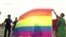 WATCH: LGBT activists staged Georgia's first pride parade amid heavy security in the capital, Tbilisi on July 8, after the event was halted earlier in the day due to security concerns. 