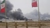 Smoke rises after strikes on the Mahshahr Petrochemical Zone in Bandar Mahshahr County