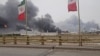 Smoke rises after apparent strikes on the Mahshahr Petrochemical Zone in Iran's Khuzestan Province on April 4. 