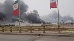 Smoke rises after apparent strikes on the Mahshahr Petrochemical Zone in Iran's Khuzestan Province on April 4. 