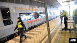 A temporary fence is erected between domestic and international tracks at Hyllie train station in southern Malmo on January 3.