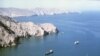 This file photo from around 1980 shows the Strait of Hormuz, a crucial 20-mile-wide sea link between the Persian Gulf oil-exporting nations and shipping lanes to oil-importing nations. 