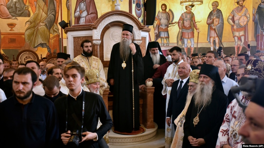 "We do not deny anything that medicine prescribes, we are merely careful," said the new head of the Serbian Orthodox Church in Montenegro, Metropolitan Joanikije II (center). (file photo)