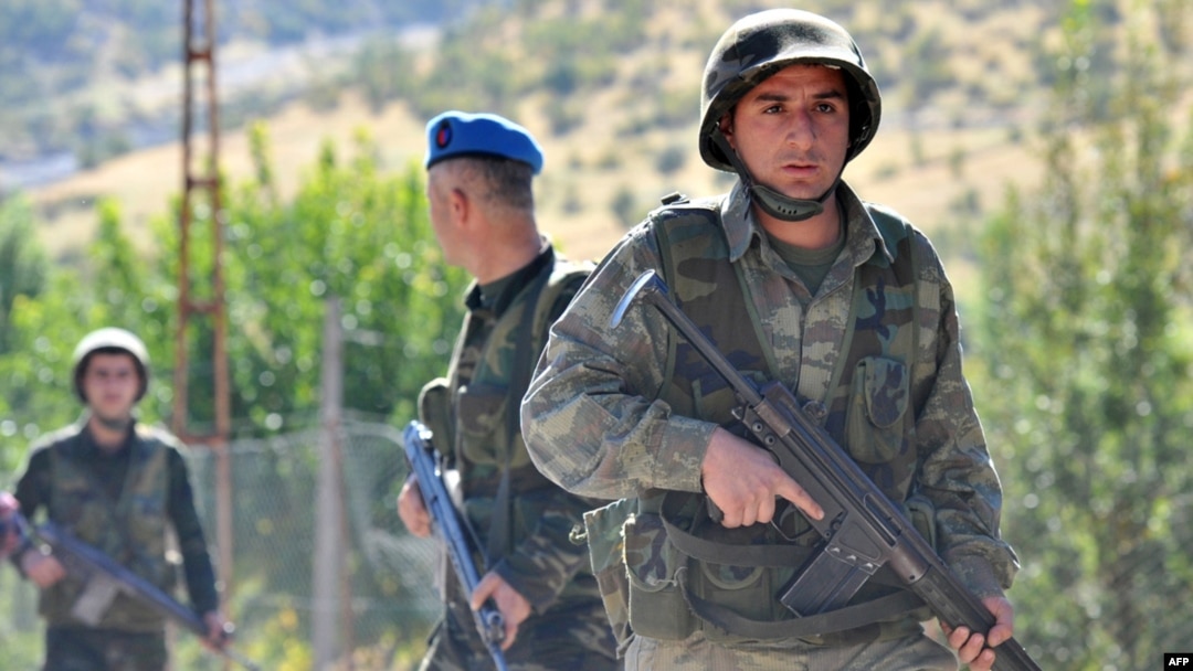 Turkish soldiers patrol on a road near the village of Uludere in the southeastern province of Sirnak, 15 kilometers from the Turkish-Iraqi border, in October.