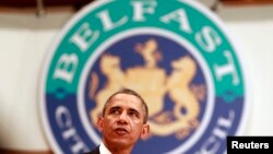 U.S. President Barack Obama speaks to guests at the Waterfront Hall in Belfast on July 17. 