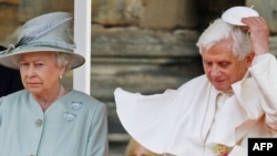 Queen Elizabeth II meets with Pope Benedict XVI in a blustery Edinburgh.