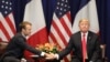 U.S. -- French President Emmanuel Macron (L) shakes hands with U.S. President Donald Trump at the start of a bilateral meeting in New York, September 24, 2018